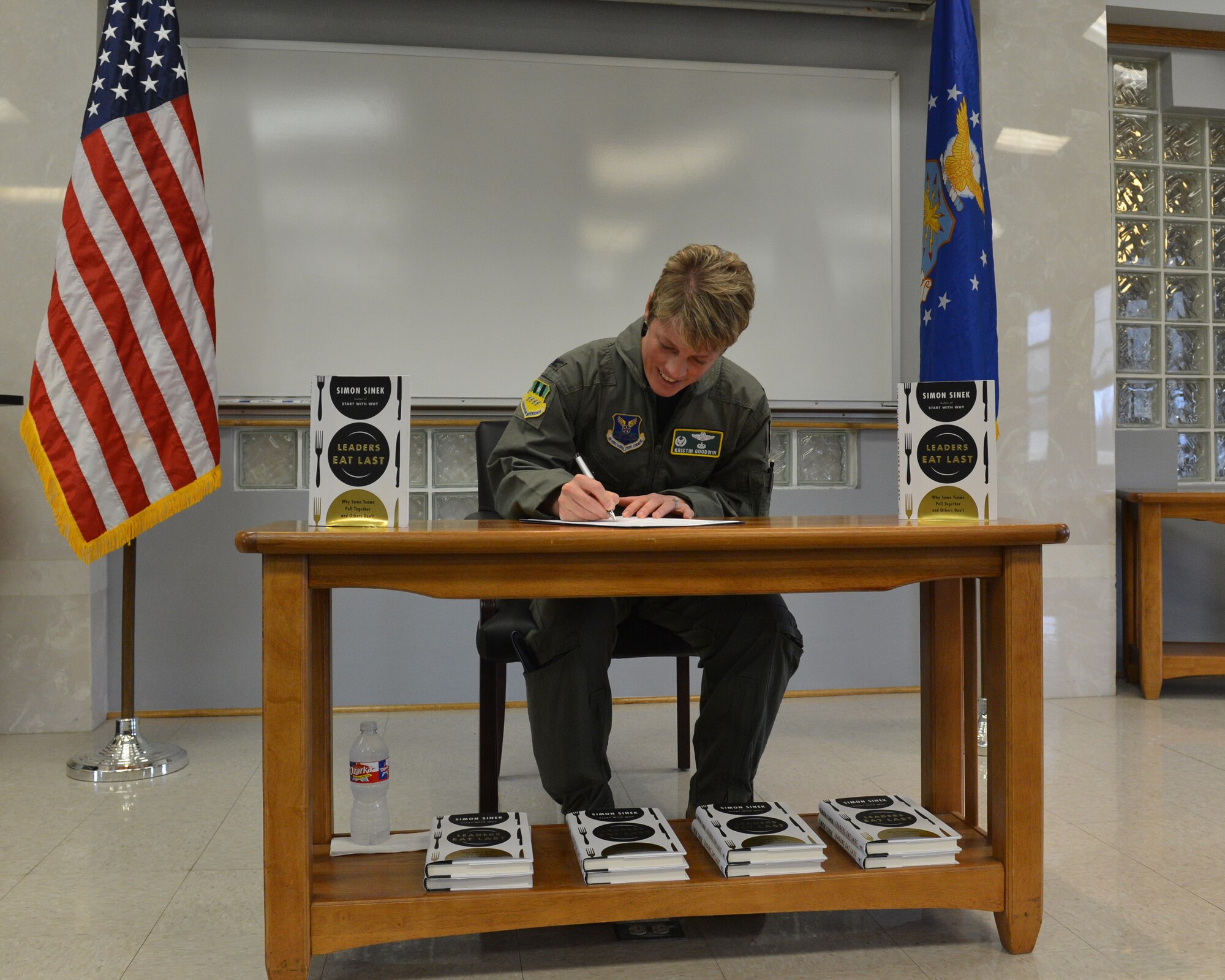 Col. Kristin Goodwin, 2nd Bomb Wing commander, signs a Year of the Leader proclamation at Airman Leadership School on Barksdale Air Force Base, La., March 20, 2015. The Year of the Leader aims to develop leaders holistically, going beyond simply giving people skills training by encouraging conversation that explores the foundational concepts of leadership. (U.S. Air Force photo/Senior Airman Benjamin Gonsier)