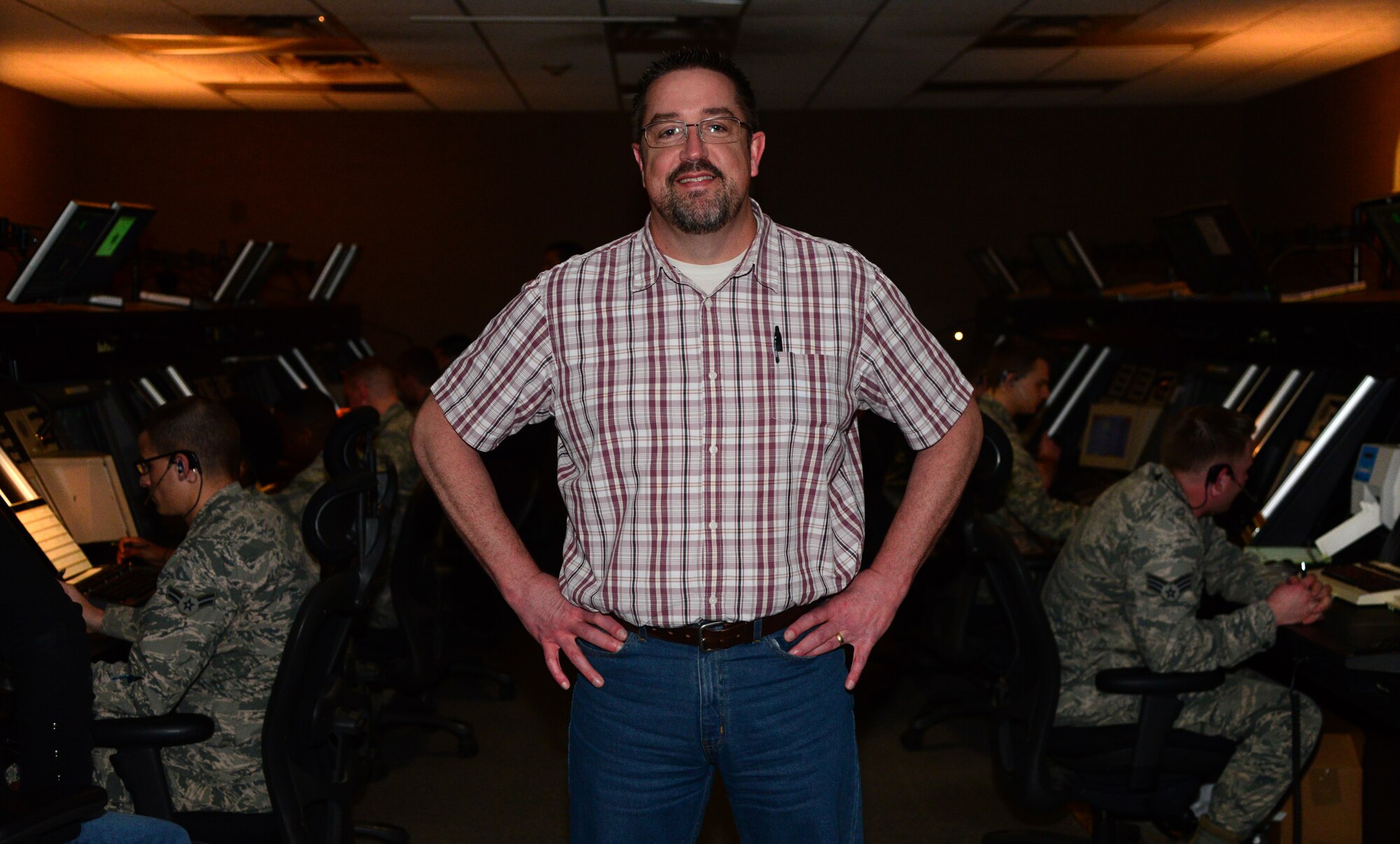 VANCE AIR FORCE BASE, Okla. -- Robert Ochs, the 71st Operations Support Squadron air traffic control manager, stands in the control room inside the radar approach control building March 12. Ochs is the Air Education and Training Command Air Traffic Control Manager of the Year for 2014. (U.S. Air Force photo / Senior Airman Frank Casciotta)