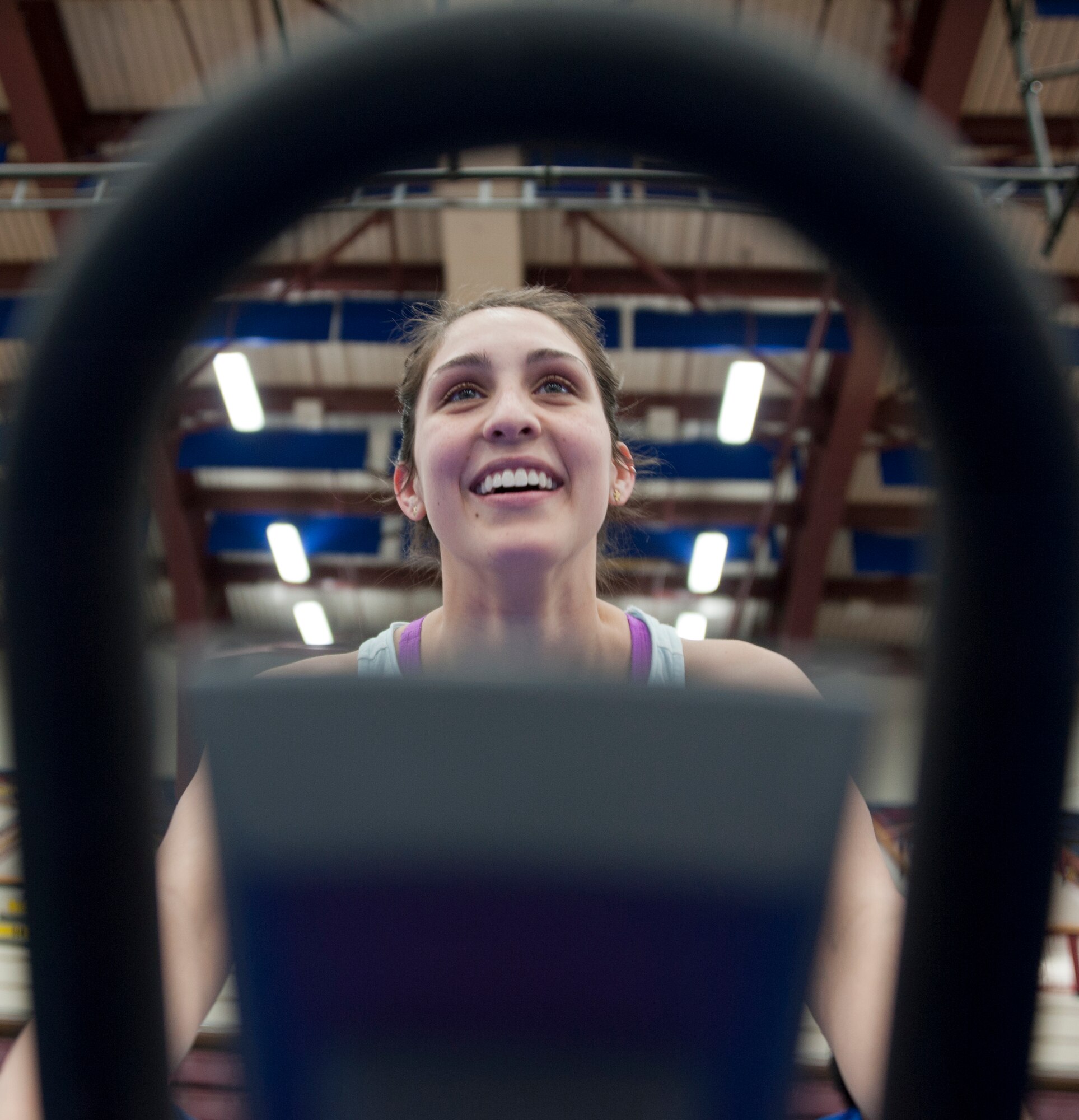 Megan Wilhite, wife of Senior Airman Galen Wilhite, 381st Intelligence Squadron cryptologic linguist, participates in a spin class on Joint Base Elmendorf-Richardson, Alaska, March 10, 2015. Spin class is offered to service members and family members at both the Buckner Physical Fitness Center and Elmendorf Fitness Center. For more information about spin class or other classes offered at the fitness centers, visit www.elmendorf-richardson.com. (U.S. Air Force photo/Airman 1st Class Tammie Ramsouer)