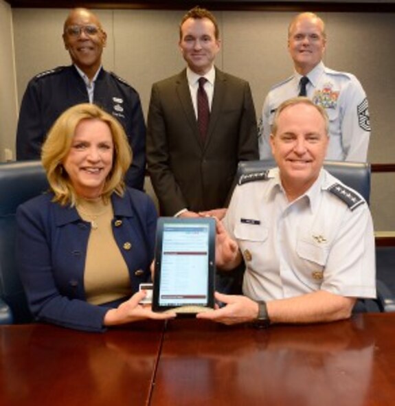 Air Force senior leaders review Air Force Assistance Fund affiliate web sites in preparation for the 2015 AFAF drive at the Pentagon. Seated are Secretary of the Air Force Deborah Lee James and Air Force Chief of Staff Gen. Mark Welsh III, and standing from the left are Air Force Vice Chief of Staff Gen. Larry Spencer, Undersecretary of the Air Force Eric Fanning and Chief Master Sgt. of the Air Force James Cody. (Courtesy photo)