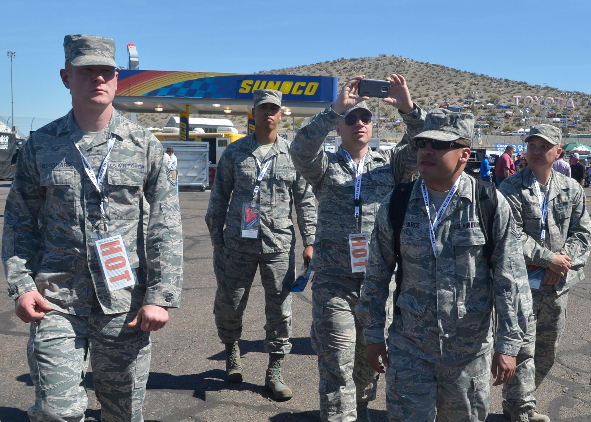 Luke Airmen walked around the garage areas of the CampingWorld.com 500 at PIR. (U.S. Air Force photo/Senior Airman Devante Williams)