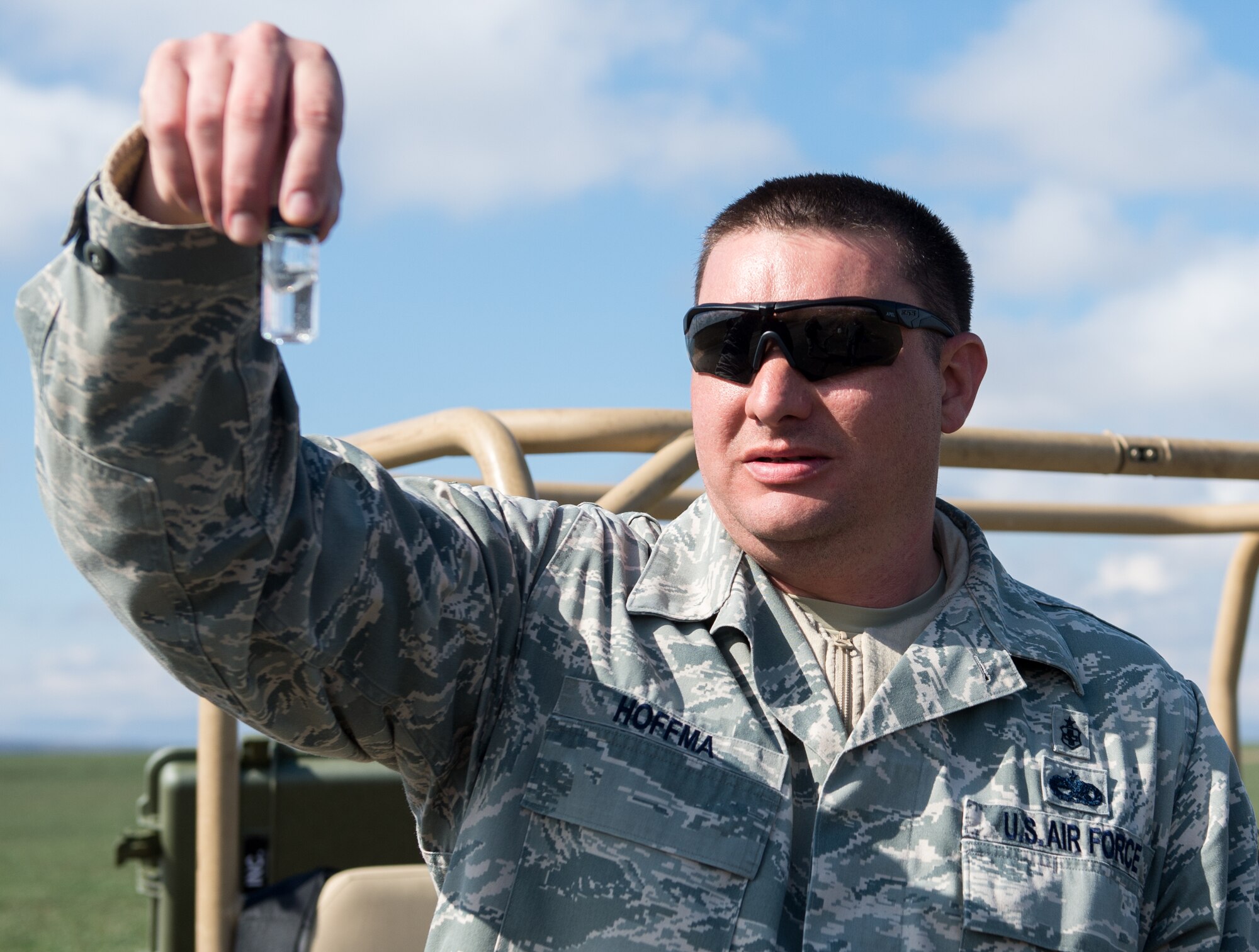 Tech Sgt. Timothy Hoffma, Det. 1, 435th Contingency Response Group bioenvironmental technician, tests the chlorination of purified water near Campia Turzii, Romania, during Dacian Warhawk, a two-week training mission designed to increase the interoperability between the U.S. and Romanian allies March 19, 2015. Hoffma and the 435th Air Ground Operations Wing tested their abilities to establish and maintain a base during fighter aircraft operations. (U.S. Air Force photo/Staff Sgt. Armando A. Schwier-Morales) 