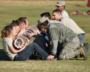 University of New Mexico's Air Force Reserve Officer Training Corps members do fitness challenges during a leadership training laboratory at Kirtland March 4. (Photo by Jamie Burnett)