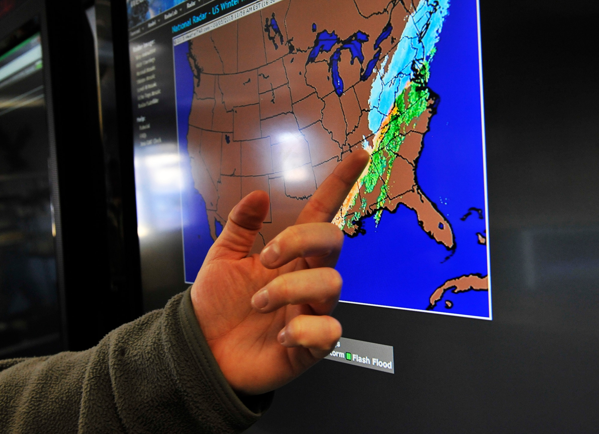 Senior Airman Christopher Steward, 509th Operations Support Squadron weather forecaster, examines the weather system radar at Whiteman Air Force Base, Mo., March 5, 2015. The radar is used to brief pilots prior to their flights. (U.S. Air Force photo by Senior Airman Keenan Berry/Released)