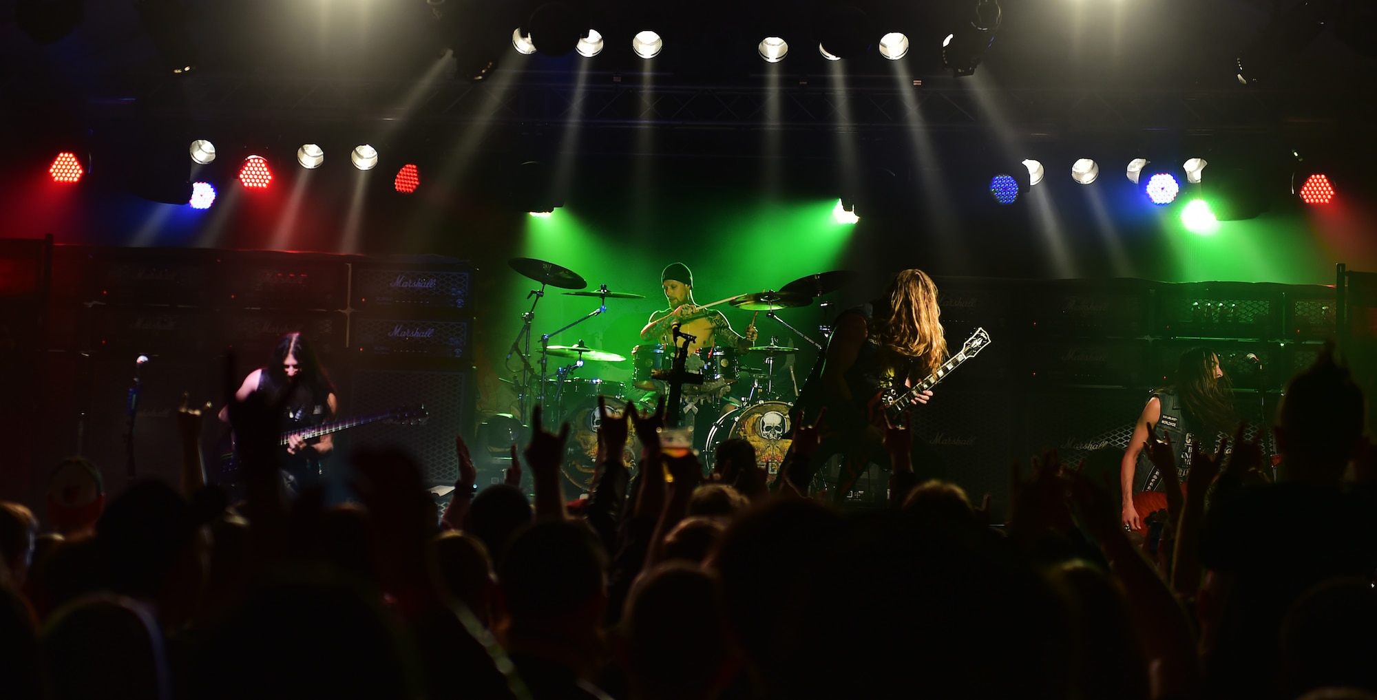 Jeff Fabb, drummer for the Black Label Society, talks to an Airman during a meet-and-greet at the Kaiserslautern Military Community Center on Ramstein Air Base, Germany, March 17, 2015. The band was able to put on a free concert for Team Ramstein with help from the USO. (U.S. Air Force photos/Staff Sgt. Sara Keller)

