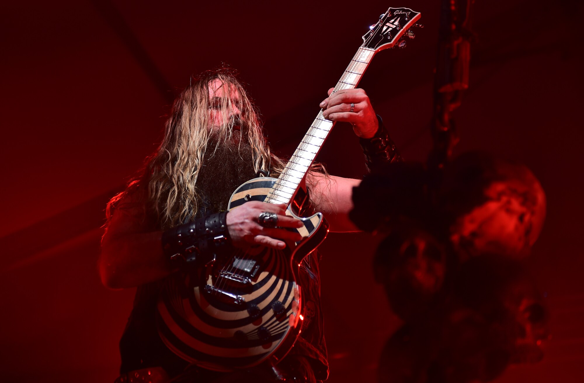 Zakk Wylde, lead vocalist, rhythm guitarist and pianist for the Black Label Society, plays a guitar during a concert for Team Ramstein at Ramstein Air Base, Germany, March 17, 2015. After touring through Europe, the band put on a free concert for Airmen and their families with help from the USO. (U.S. Air Force photos/Staff Sgt. Sara Keller)