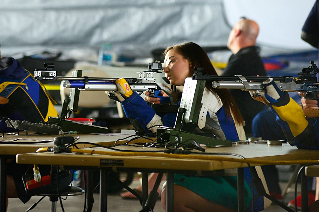 Retired airman Sadie Strong takes aim during rifle shooting at the Wounded Warrior Pacific Trials on Ford Island, Joint Base Pearl Harbor-Hickam, March 12, 2015.