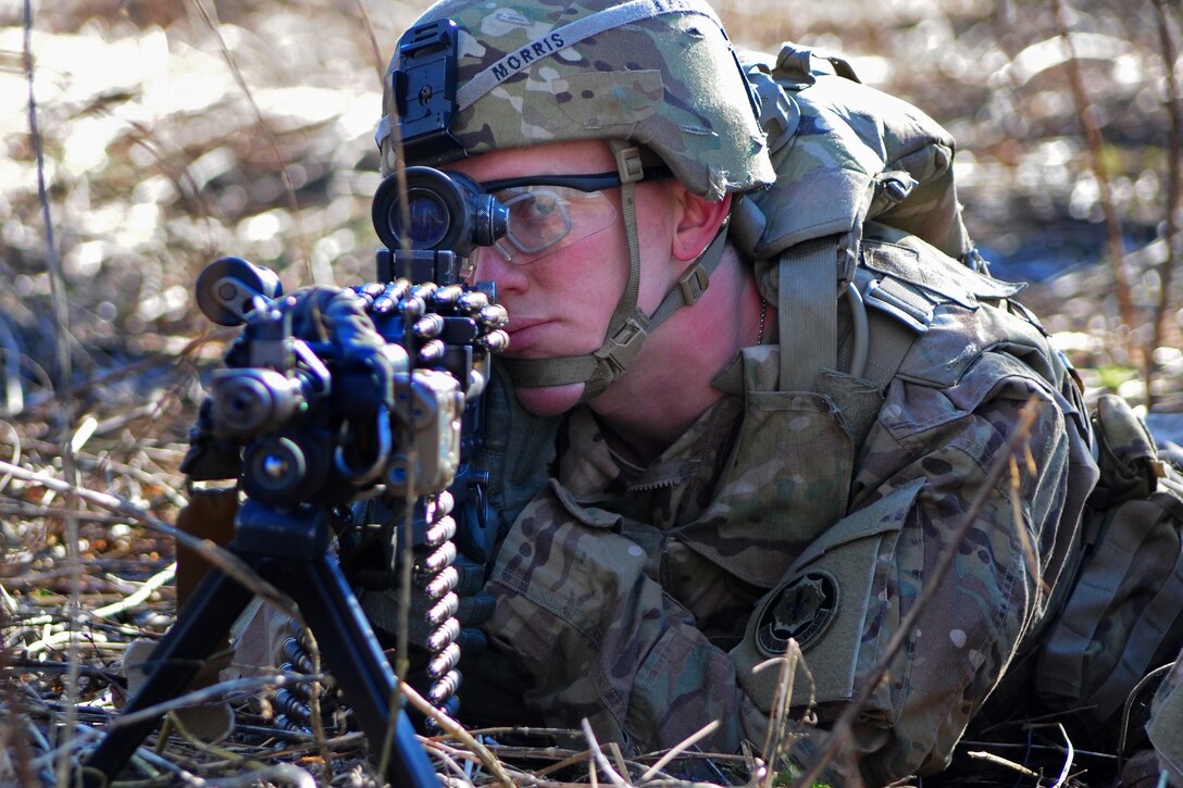 U.S. Army Pfc. Vance S. Morris provides rear security during an ...