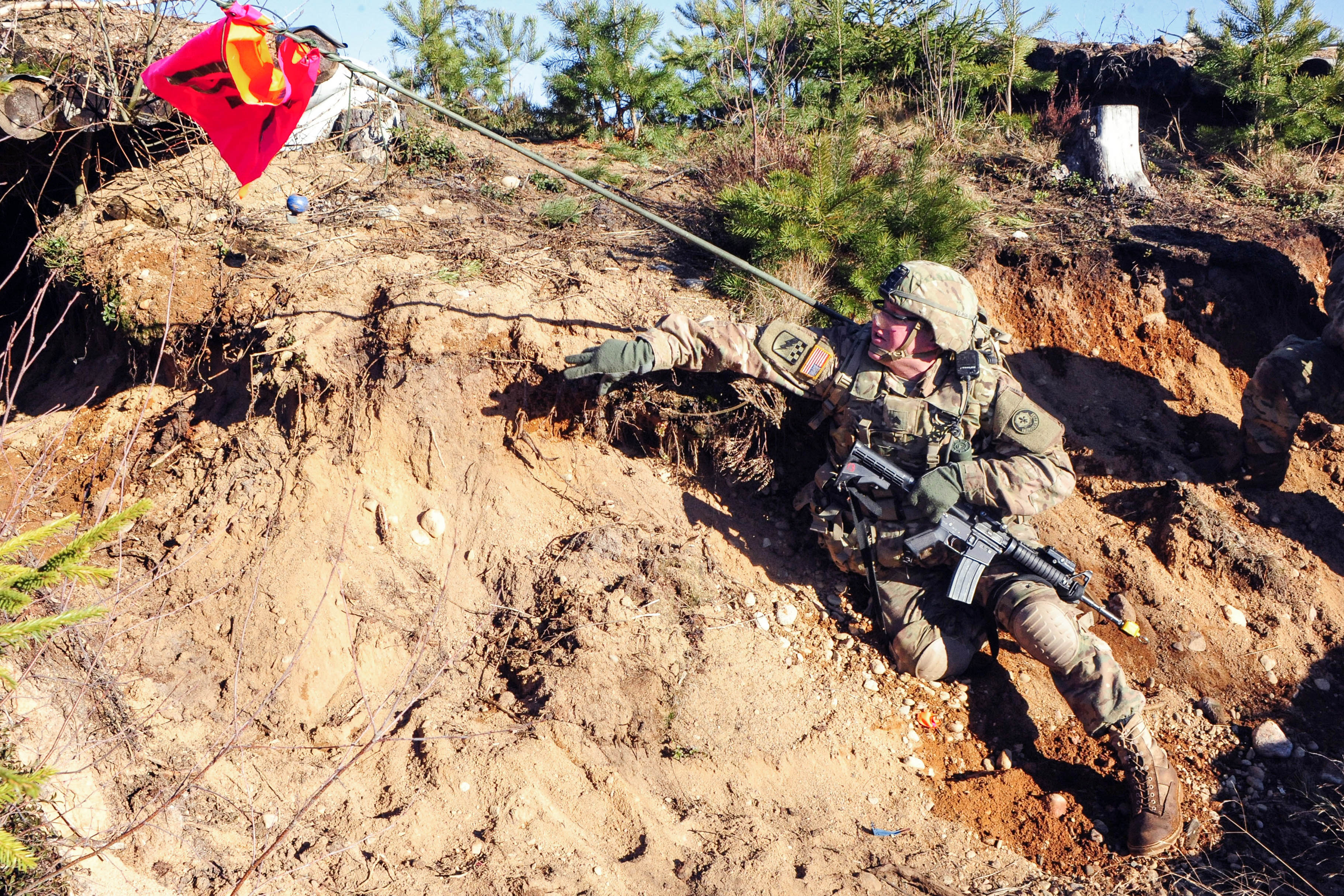 U S Army Sgt Andrew C Mabry Throws A Dummy Hand Grenade Into An 