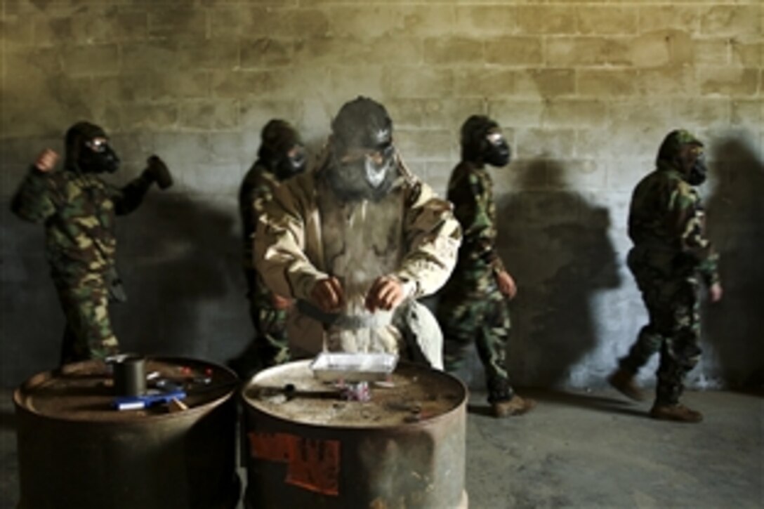 Marine Sgt. Carlos Iruegas prepares tear gas in the gas chamber on Marine Corps Base Hawaii, March 19, 2015. Gas chamber training is an annual requirement for Marines. Iruegas is a Pacific chemical, biological, radiological and nuclear defense chief assigned to U.S. Marine Corps Forces.

