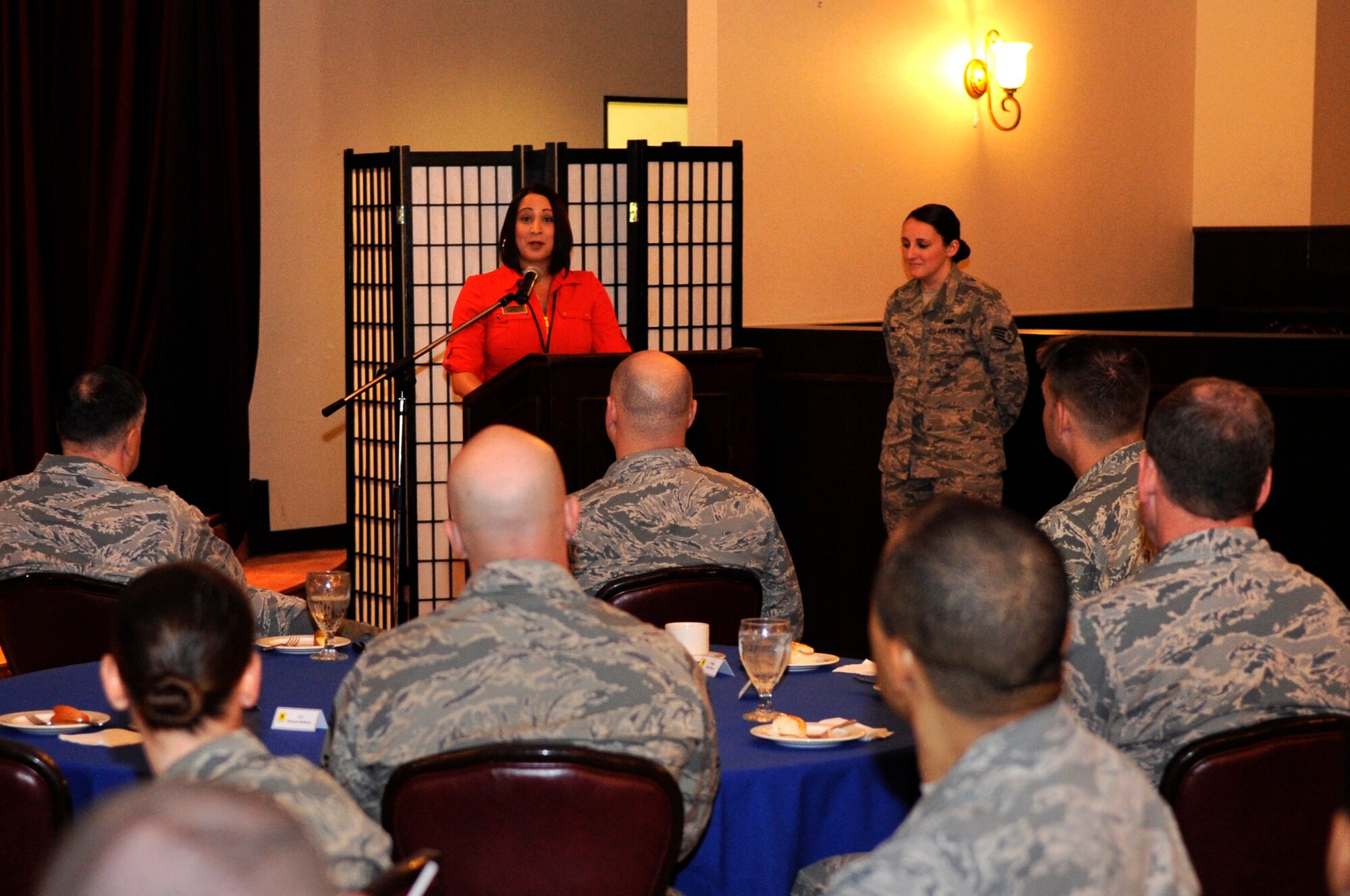 Najette Pinero, 18th Force Support Squadron Airman & Family Readiness community readiness specialist, gives statistics about the Air Force Assistance Fund on Kadena Air Base, Japan, March 23, 2015. Pinero said the number one need for the AFAF here is emergency travel for Airmen, which was able to give more than $75,000 to Airmen in need. (U.S. Air Force photo by Staff Sgt. Marcus Morris)