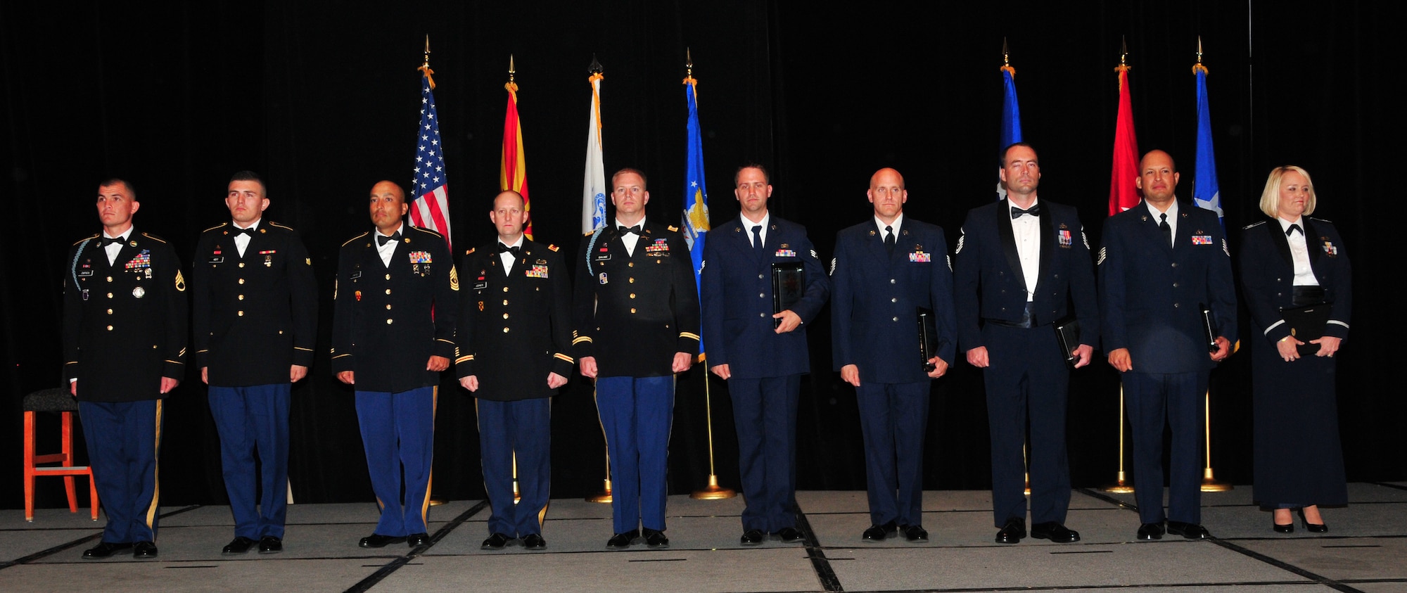 Winners are applauded at the Outstanding Soldiers and Airmen of the Year banquet held at the Arizona Grand hotel, Phoenix, March 21. The annual OSAY banquet is held to honor the Soldiers and Airmen, the best of the best, of the Arizona Army and Air National Guard whose outstanding hard work, dedication, and professionalism has earned them recognition by their respective units. (U.S. Air National Guard photo by Tech. Sgt. Courtney Enos)