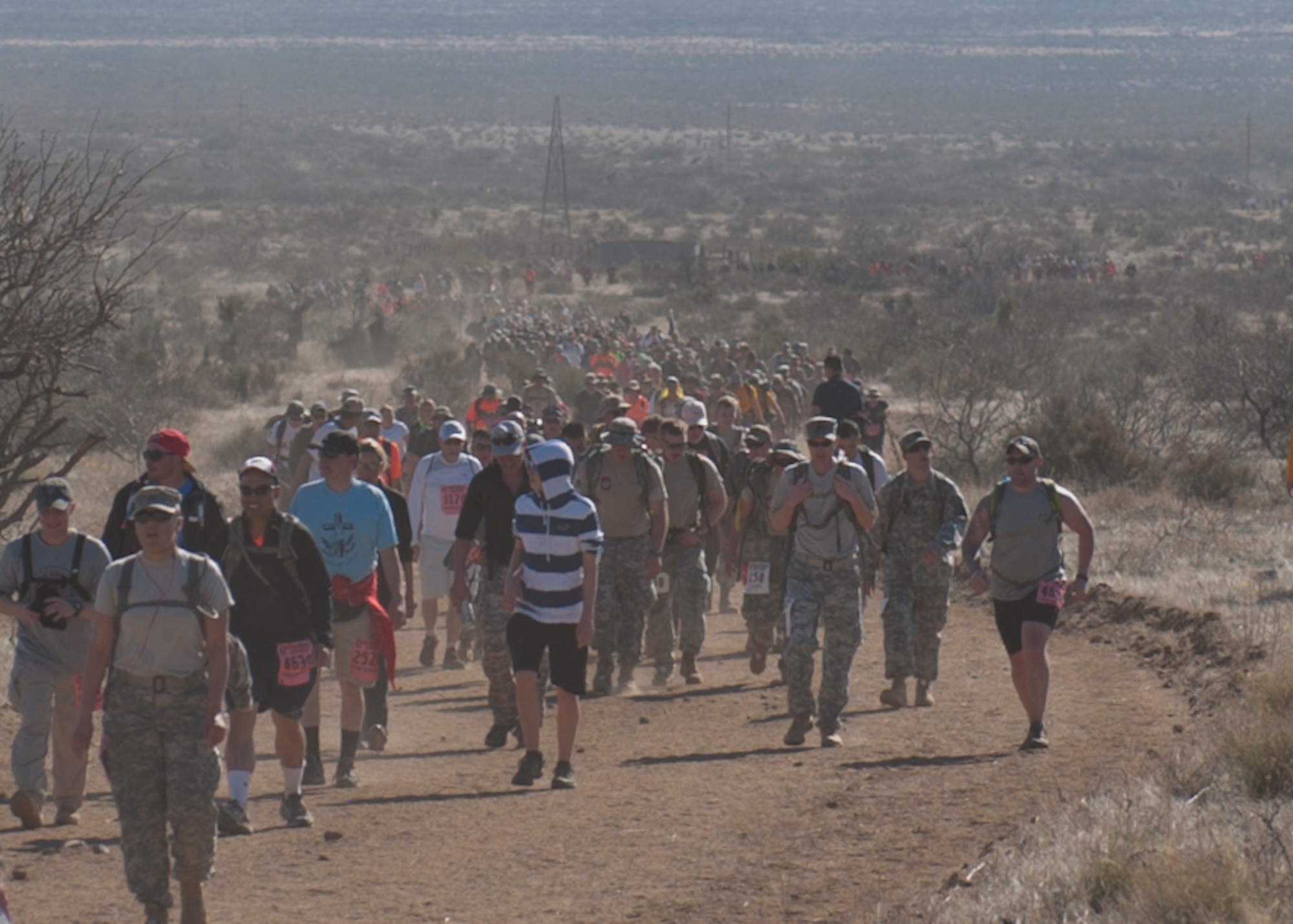 More than 5,600 military members, retires, civilians, ROTC Cadets, veterans, and wounded warriors participated in the 26th annual Bataan Memorial Death March at White Sands Missile Range, N.M. March 22, 2015. The Bataan Memorial Death March was created to honor the 75,000 Filipino and American troops who sacrificed their freedom, health, and in many cases their lives to defend Luzon, Corregidor and harbor defense forts of the Philippines in 1942 during World War ll. (U.S. Air Force photo by Staff Sgt. E’Lysia A. Wray/Released)
