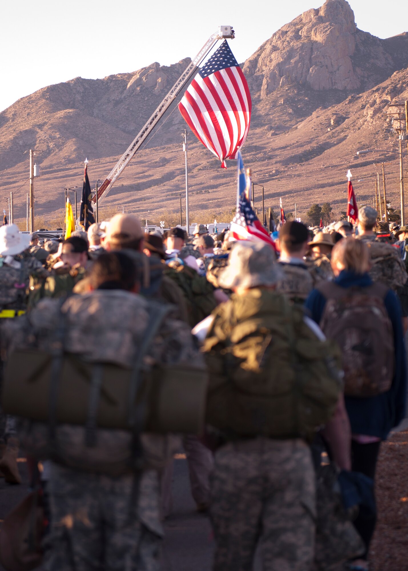 Participants of the 26th annual Bataan Memorial Death March line up to begin the 26.2-mile march through White Sands Missile Range, N.M. March 22, 2015. “This memorial march pays tribute to the bravery, heroism and sacrifice of those who defended Luzon, Corregidor and harbor defense forts of the Philippines in 1942 during World War ll,” said Brig. Gen. Timothy R. Coffin, U.S. Army White Sands Missile Range commanding general. U.S. Air Force photo by Staff Sgt. E’Lysia A. Wray/Released)
