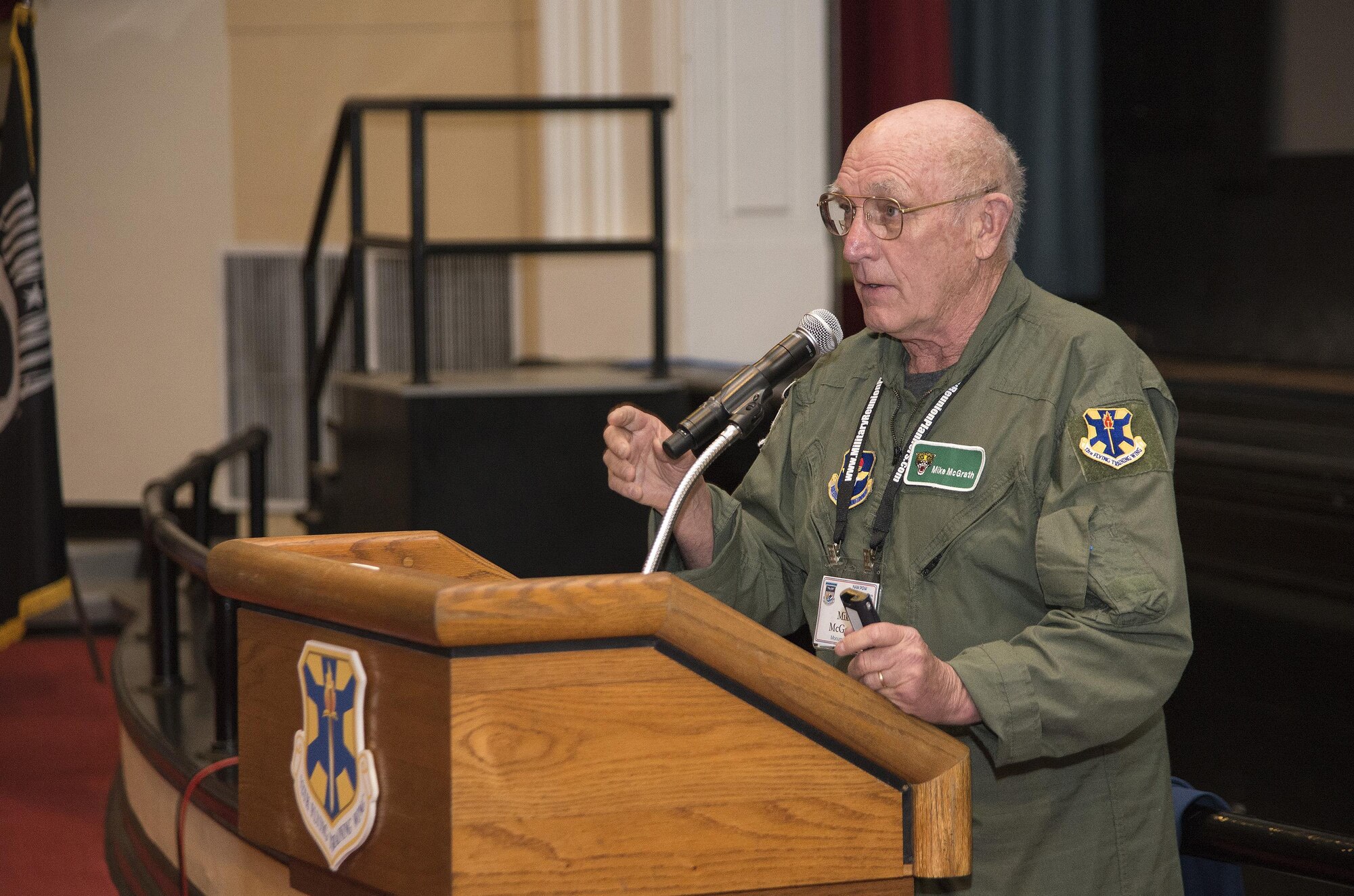 Retired Navy Capt. Mike McGrath, former Vietnam War POW, speaks about his experiences in captivity at the 18th Annual POW/MIA Symposium, hosted by the 560th Flying Training Squadron at the Joint Base San Antonio-Randolph Fleenor Auditorium March 20. McGrath was shot down by enemy fire over North Vietnam June 30, 1967 flying an A-4C “Skyhawk”. He was held as a POW for almost six years until his release March 4, 1973. The annual Freedom Flyer Reunion tradition began when members of the 560th FTS were given the task to retrain more than 150 POWs returning to flying status toward the end of American involvement in the Vietnam War. (U.S. Air Force photo by Johnny Saldivar)