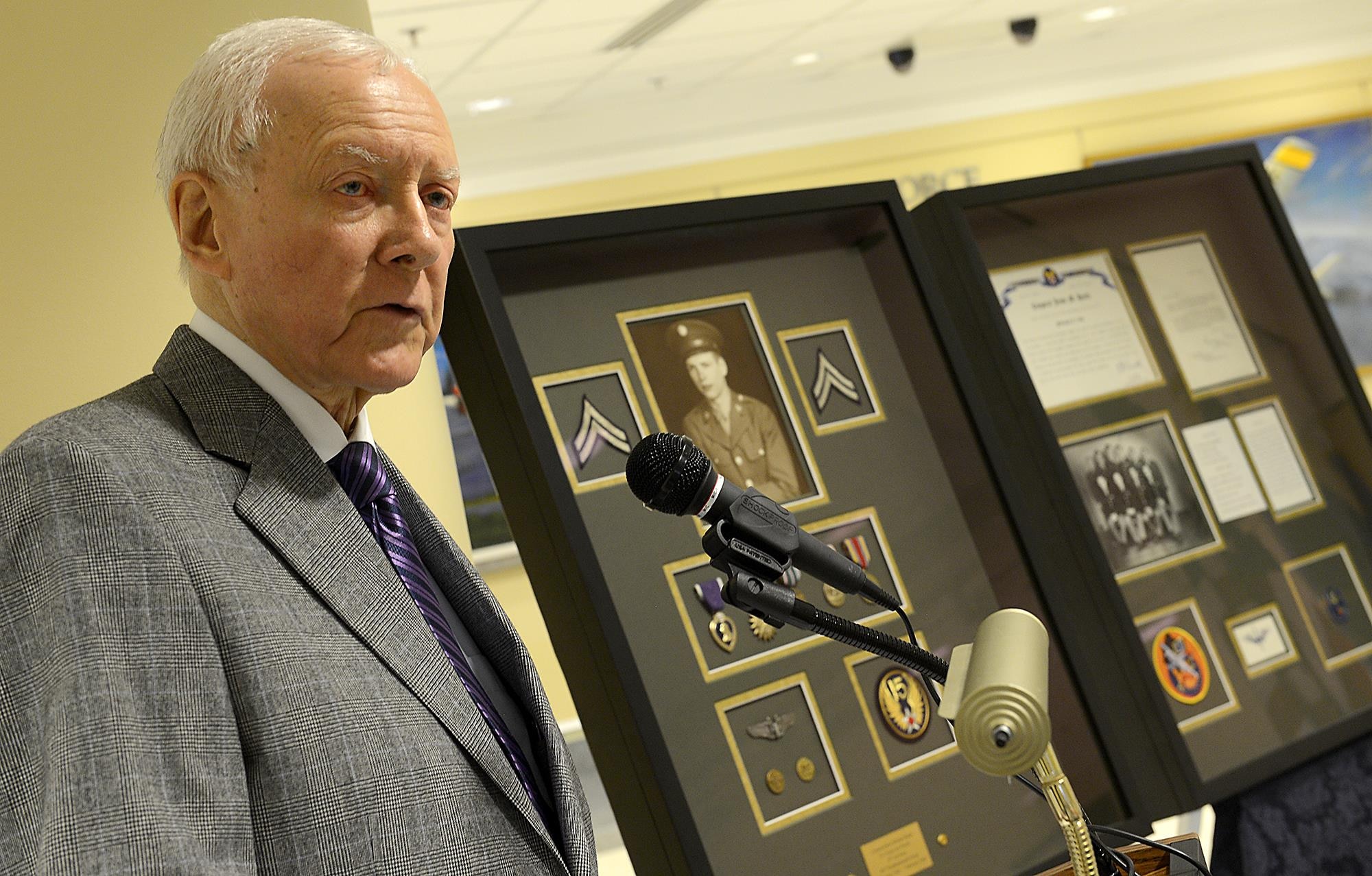 Sen. Orrin Hatch of Utah, thanks Secretary of the Air Force Deborah Lee James for presenting him with two shadow boxes March 20, 2015, at the Pentagon in Washington D.C.  The shadow boxes honored the service of his brother, Cpl. Jesse Hatch, who died with his crew during a mission in World War II. Cpl. Hatch was a nose turret gunner with the 451st Bombardment Group, 725th Bomb Squadron. (U.S. Air Force photo/Scott M. Ash)