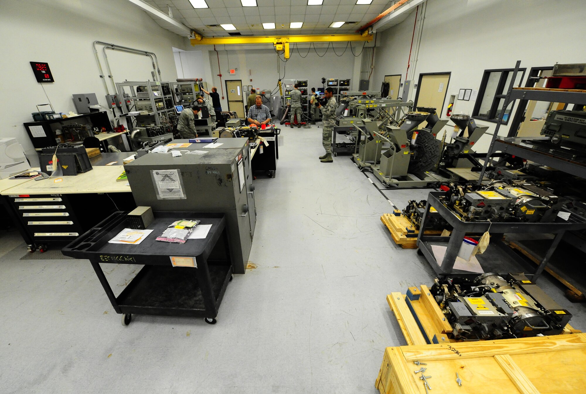Airmen of the 1st Special Operations Component Maintenance Squadron conduct repairs to aircraft machinery at Hurlburt Field Fla., March 3, 2015. The 1st SOCMS provides command-wide, organizational and intermediate-level repair capability for a variety of aircraft. (U.S. Air Force photo/Airman 1st Class Andrea Posey)