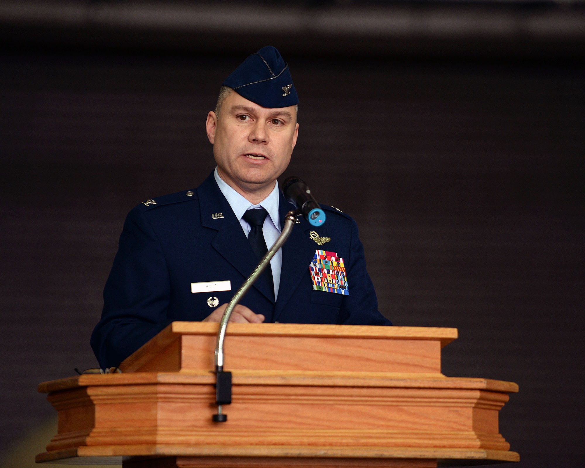 U.S. Air Force Col. William Holt, 352nd Special Operations Wing commander, speaks during the 352nd SOW activation ceremony March 23, 2015, on RAF Mildenhall, England. The 352nd SOW is comprised of more than 1,200 active-duty and civilian Airmen performing missions on MC-130J Commando II and CV-22B Osprey aircraft for AFSOC.  (U.S. Air Force photo by Senior Airman Christine Griffiths)