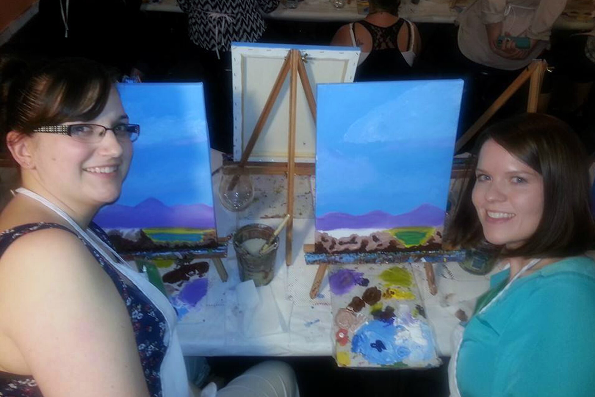 SAN ANGELO, Texas -- Emily Kinney and Andrea Langis, Goodfellow Combined Spouses Club members, paint at Vino Dipinte Art Gallery March 12. The GCSC is open to all Goodfellow Air Force Base spouses. (Photo/Andrea Langis)