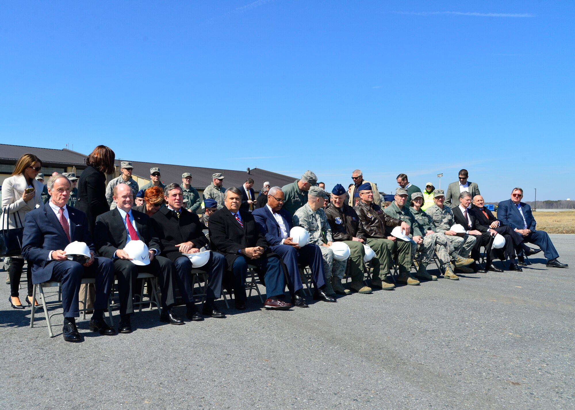 Team Dover and Delaware Congressional leaders attend a Runway Repair Groundbreaking ceremony March 23, 2015, at Dover Air Force Base, Del. Runway 01-19 is undergoing renovations and is expected to reopen in June 2016. (U.S. Air Force photo/Airman 1st Class William Johnson)