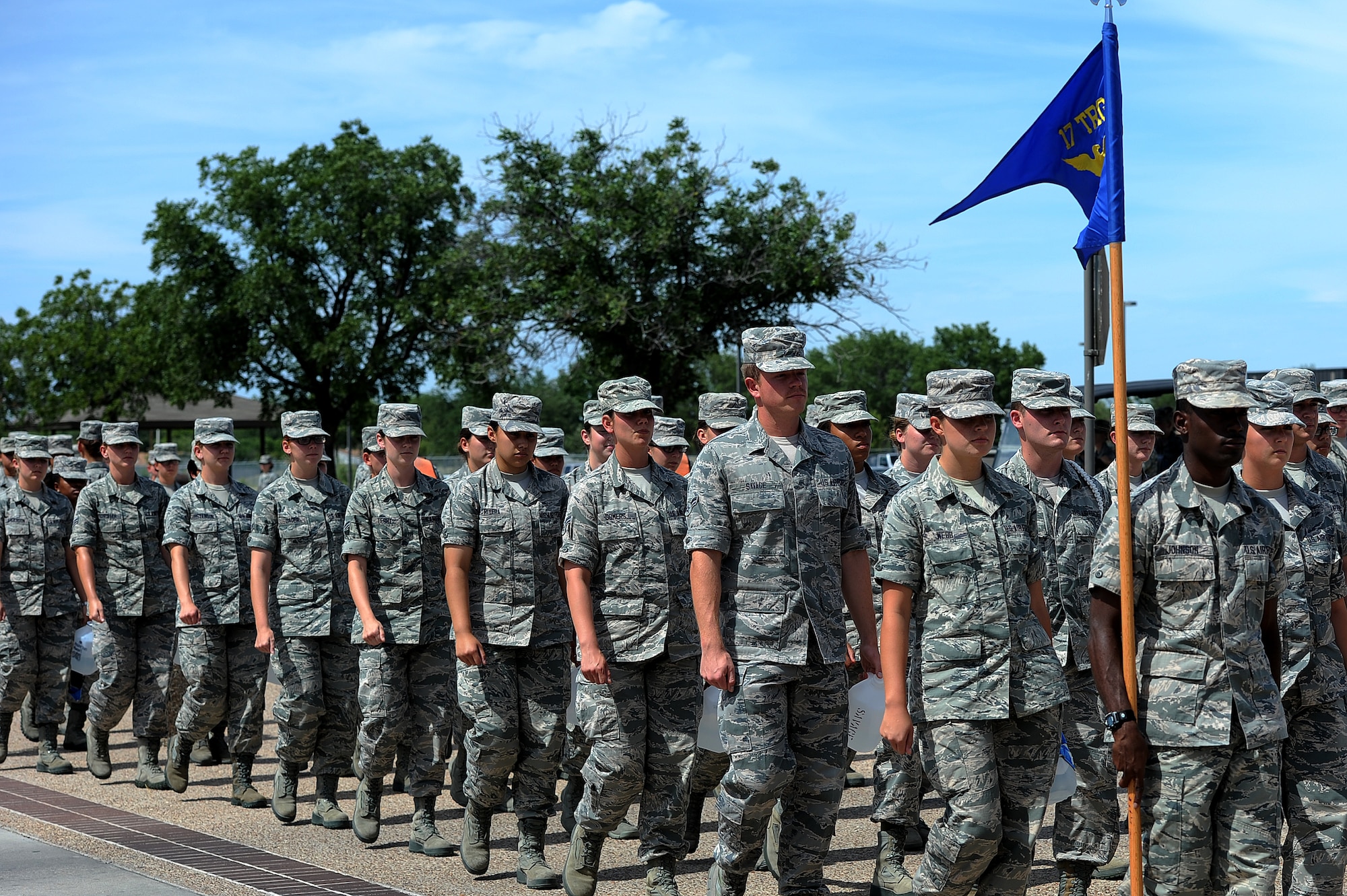 GOODFELLOW AIR FORCE BASE, Texas -- 17th Training Group students march from class on the troop walk July 1, 2014. 17th TRG leadership will change the rules for pipeline students just entering the military in order to make more effective use of their time and focus more on character development April 1, 2015. (U.S. Air Force photo/ Airman 1st Class Devin Boyer)