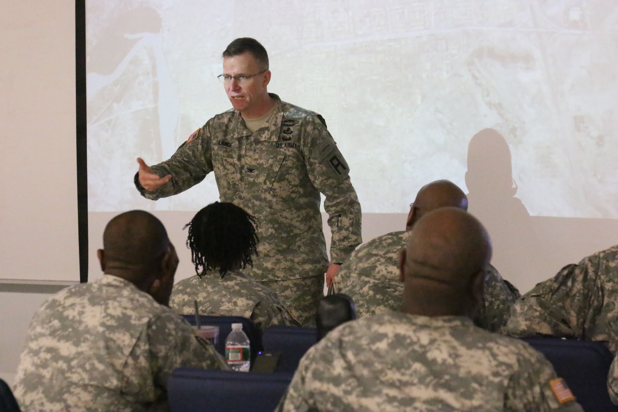 Army Col. John K. Lange, 72nd Field Artillery Brigade commander, discussed the importance of virtual modeling capabilities as useful training tools for Observer, Controller/Trainers at Army Support Activity Dix on Joint Base McGuire-Dix-Lakehurst, N.J., March 12, 2015. (U.S. Army photo by Maj. Antonia Greene-Edwards/Released)