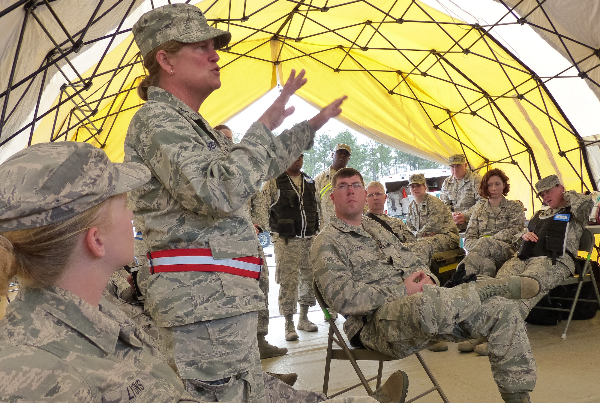 U.S. Air Force Col. Muriel Herman, commander 116th Medical Group, Georgia Air National Guard, briefs her medical team during Exercise Vigilant Guard 2015, Georgetown, S.C., March 11, 2015.  Vigilant Guard is a series of federally funded disaster-response drills conducted by National Guard units working with federal, state and local emergency management agencies and first responders. (U.S. Air National Guard photo contributed/Released)