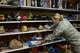 Senior Master Sgt. Shannon Last adds toys to shelves at the Chief Master Sgt. Gene R. Collins Airman’s Attic at Scott Air Force Base, Illinois on March 12, 2015. Scott’s Airman’s Attic is manned 100 percent by volunteers, who accept and sort donations, shelve them, and assist customers. The Airman’s Attic is open to military members E-4 and below and their direct dependents. All ranks can get books and uniforms. Last is the Mission Support Cell Manager at the 618th Air Operations Center. (U.S. Air Force photo by Senior Airman Sarah Hall-Kirchner/Released)