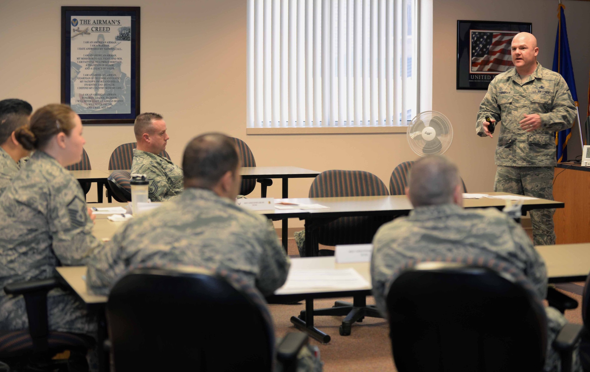 Master Sgt. Johnny Crenshaw, 28th Force Support Squadron career assistance advisor, teaches a Senior NCO professional enhancement class at Ellsworth Air Force Base, S.D., March 9, 2015. Crenshaw advises commanders and supervisors on retention issues, assists in career counseling, and helps Airmen on career progression and planning. (U.S. Air Force photo by Airman 1st Class Rebecca Imwalle/Released) 