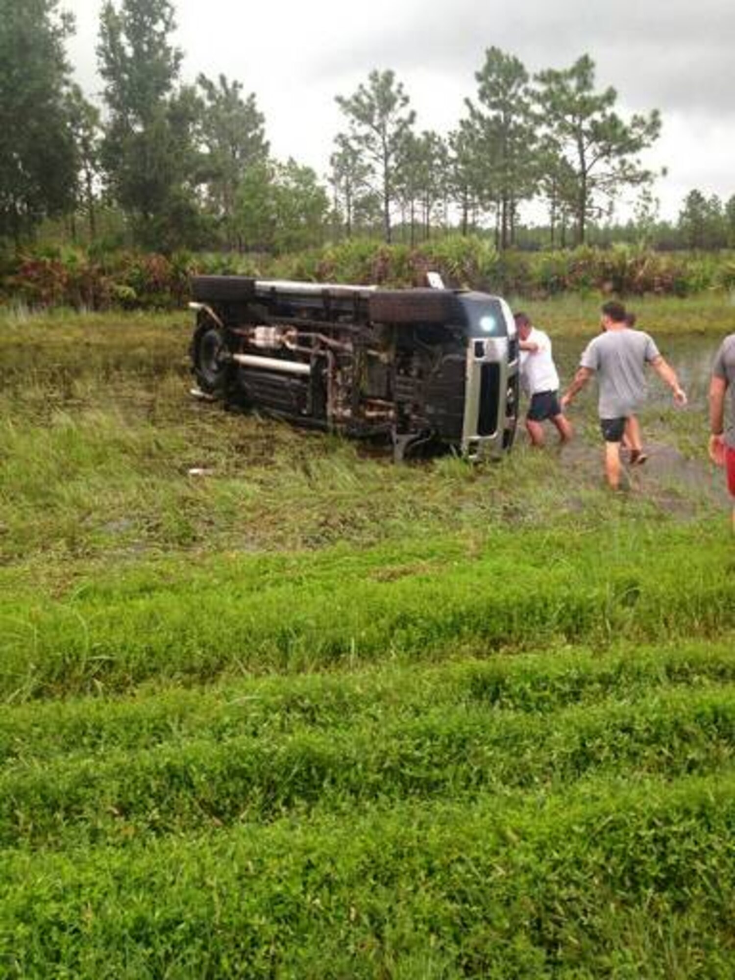 While en route to Orlando, Fla., 2nd Lt. Benjamin Deschane, 5th Space Launch Squadron ordnance engineer for the Atlas V rocket program, assigned to Patrick Air Force Base, Fla., witnessed a car accident and pulled over to help, Aug. 8, 2014. In the midst of the commotion, a few other Samaritans arrived on scene where he led them through the Self-Aid Buddy Care process that the military taught him. (Courtesy photo) (For limited release) 