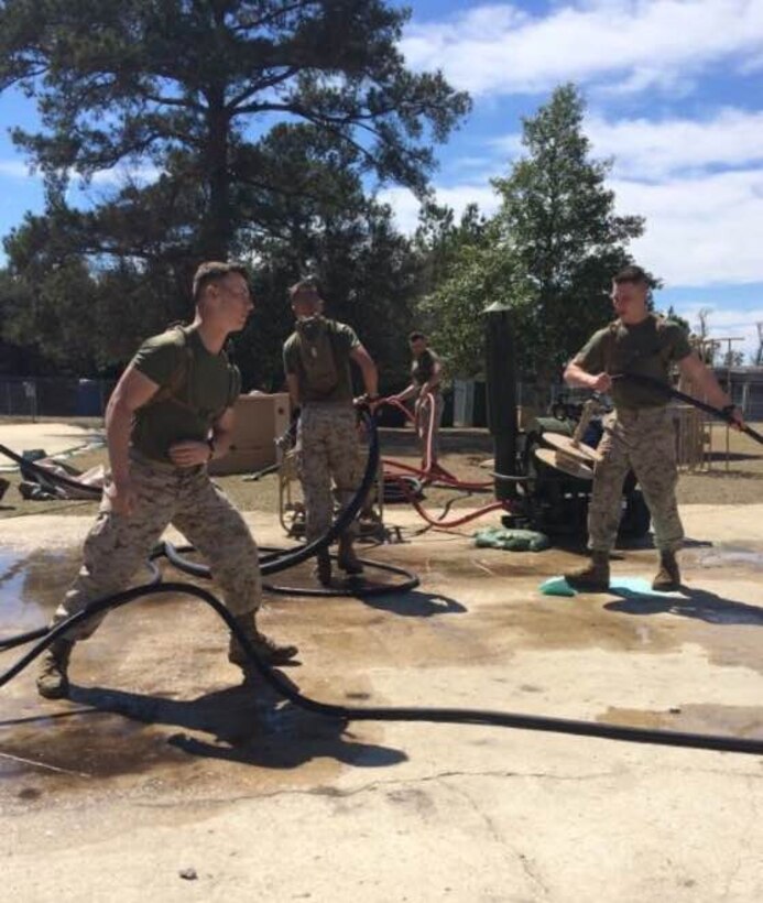 Marines from BWST 5-15 learn to set up and prepare Bare Base Shower Units for operation.