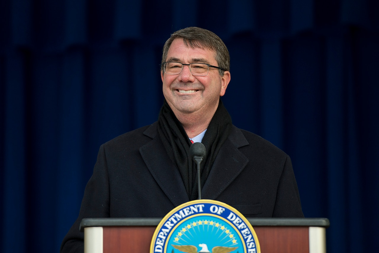 U.S. Defense Secretary Ash Carter shares a light moment with the crowd as he speaks in the Pentagon center courtyard while hosting Afghan President Ashraf Ghani and Chief Executive Dr. Abdullah Abdullah for a visit, March 23, 2015. Carter and Ghani both delivered remarks, thanking service members and veterans who served in Afghanistan for their efforts and sacrifices. DoD photo by U.S. Navy Petty Officer 2nd Class Sean Hurt