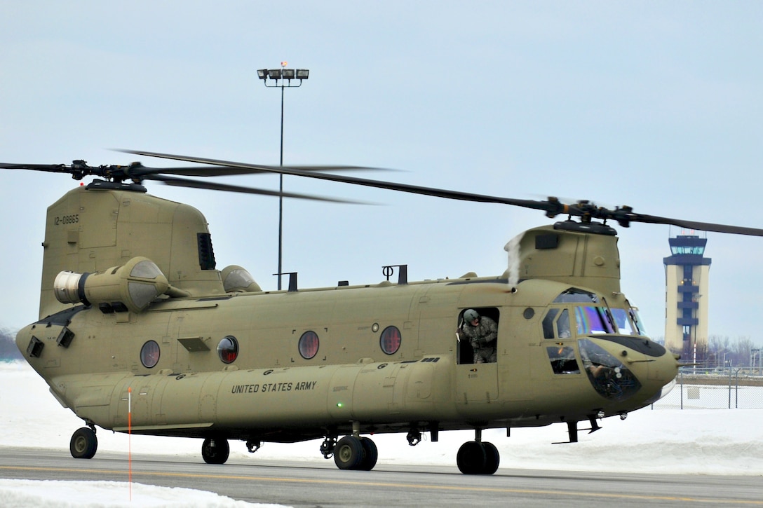 A CH-47 Chinook helicopter lands at Hancock Field Air National Guard Base, Syracuse, N.Y., March 14, 2015.