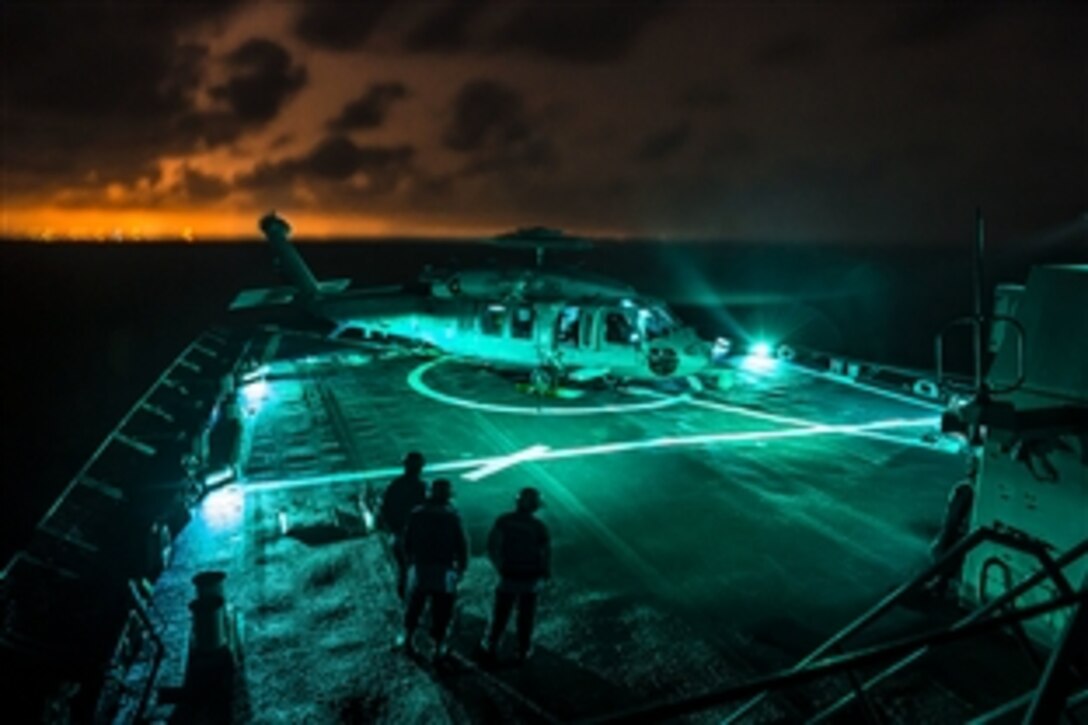 An SH-60S Seahawk helicopter lands aboard the guided-missile destroyer USS Ross in the Mediterranean Sea, March 21, 2015. The Ross is deployed to Rota, Spain, conducting naval operations in the U.S. 6th Fleet area of operations. The Seahawk is assigned to Helicopter Sea Combat Squadron 28. 
