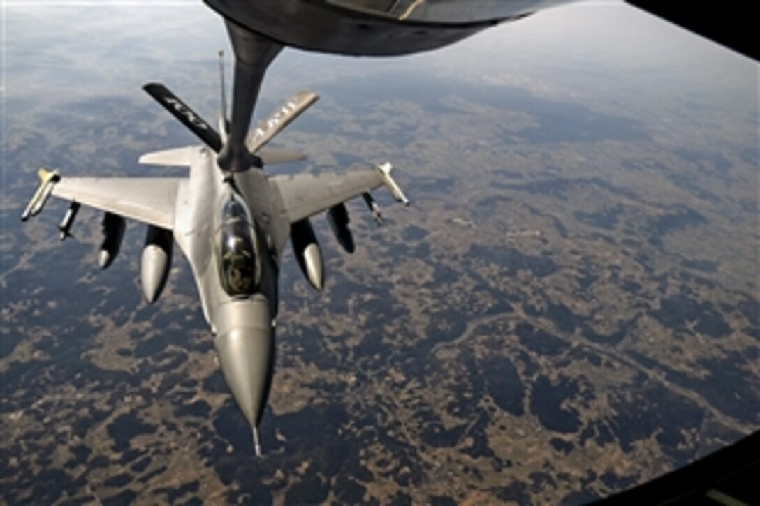 A KC-135 Stratotanker refuels a U.S. Air Force F-16 Fighting Falcon over Europe, March 20, 2015. The F-16 is assigned to the 31st Fighter Wing, Aviano Air Base, Italy. The Stratotanker is assigned to the 100th Air Refueling Wing.

