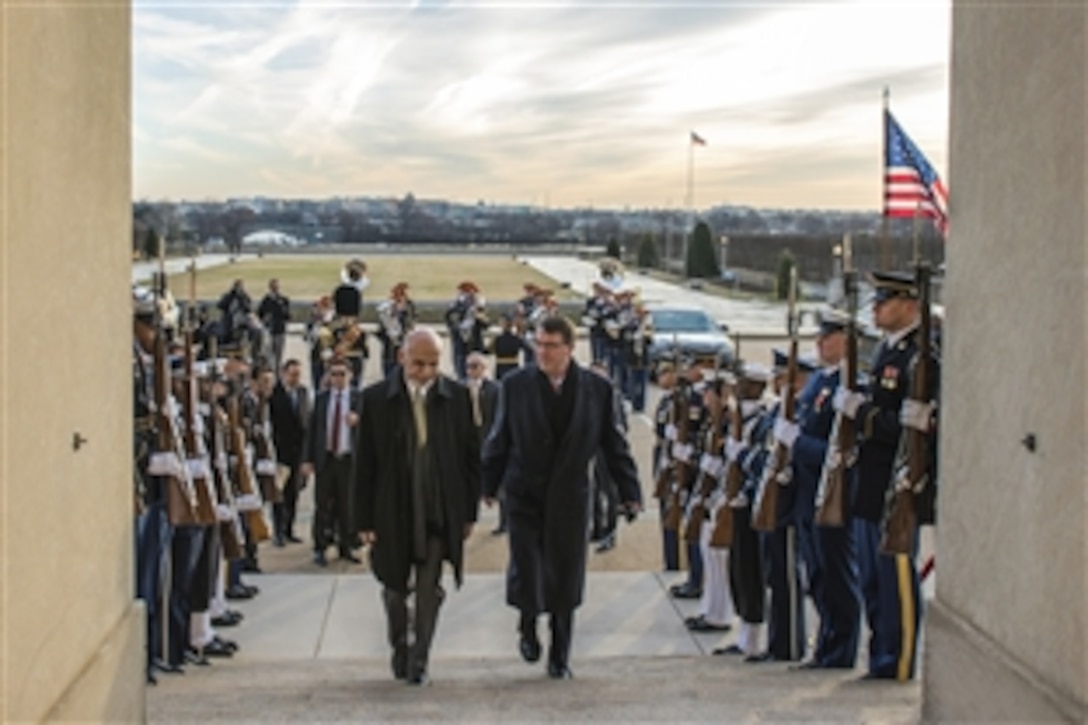 U.S. Defense Secretary Ash Carter, right, hosts an enhanced honor cordon for Afghan President Ashraf Ghani at the Pentagon, March 23, 2015. The leaders met to discuss matters of mutual importance. During remarks in the Pentagon's courtyard, Ghani thanked U.S. service members and veterans who served in Afghanistan for their efforts and sacrifices.