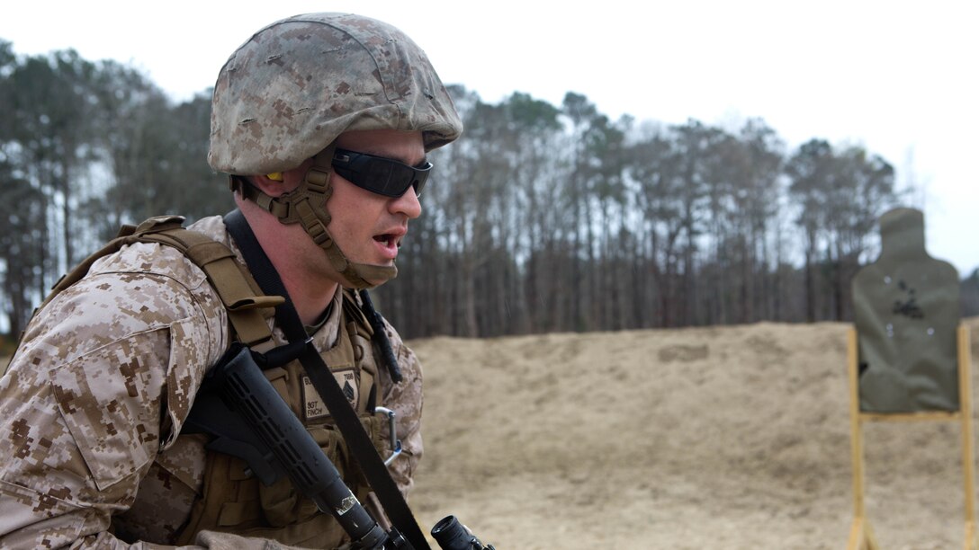 Sergeant Shaun Finch, a bulk fuel specialist with Bulk Fuel Company, 8th Engineer Support Battalion, 2nd Marine Logistics Group, prepares to pivot toward his target during a table-three shooting qualification aboard Marine Corps Base Camp Lejeune, N.C., March 19, 2015. The Marines conducted various maneuvers during the table three shoot, including walking toward the targets, kneeling and pivoting. 