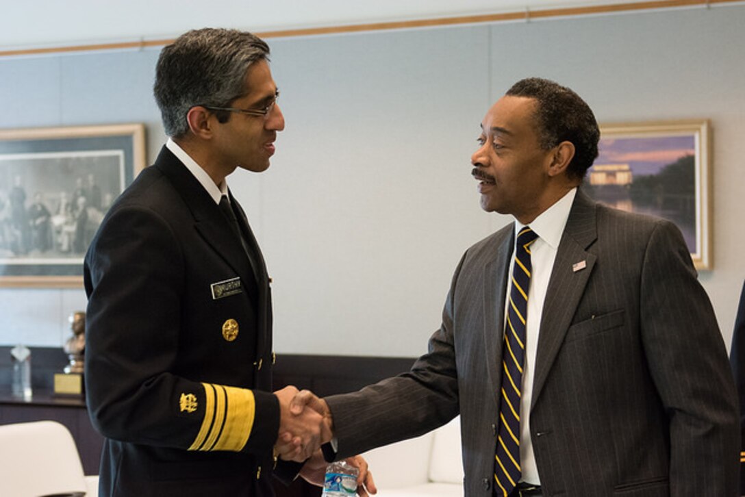Vice Admiral Dr. Vivek Murthy (l), U.S. Surgeon General, and Dr. Jonathan Woodson (r), Assistant Secretary of Defense for Health Affairs, discuss public health issues during the IHLR roundtable at NDU.