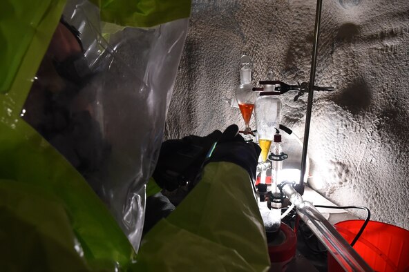 Staff Sgt. Jonathan Moroz scans a mock chemical lab for chemical agents March 17, 2015, in the Memorial Tunnel at the Center for National Response on, in Gallagher, W.Va. This training is part of the annual Black Flag exercise for first responders. Moroz is the NCO in charge of bioenvironmental training for the 779th Aerospace Medical Squadron, at Joint Base Andrews, Md. (U.S. Air Force photo/Senior Airman Joshua R. M. Dewberry)