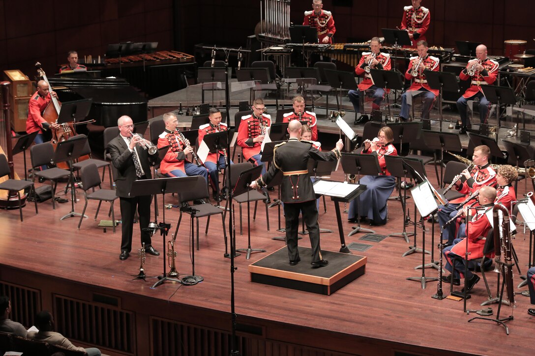 On March 19, 2015, the Marine Band performed at Messiah College in Mechnicsburg, Pa. The program, conducted by Lt. Col. Jason K. Fettig, included music by Samuel Jones, David Conte, Maurice Ravel, Bernard Hermann, John Philip Sousa, and John Williams. The concert was a part of the National Trumpet Competition and also featured guest soloist John Rommel performing David Gillingham’s When Speaks the Signal-Trumpet Tone. (U.S. Marine Corps photo by Gunnery Sgt. Amanda Simmons/released)