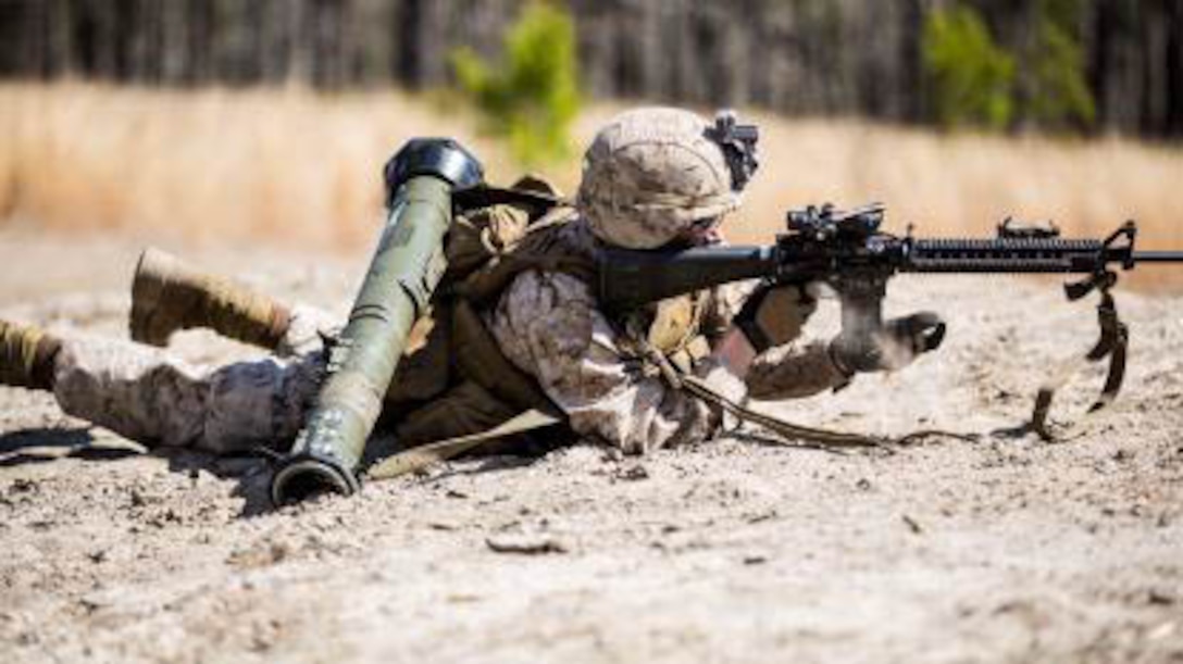 A Marine with Charlie Company, 1st Battalion, 6th Marine Regiment conducts a speed reload on his M16 A-4 service rifle during a live-fire, fire-team attack range exercise aboard Camp Lejeune, N.C., March 18, 2015. One fire-team at a time conducted the attack, advancing across a field while providing suppressive fire and utilizing various munitions. 
