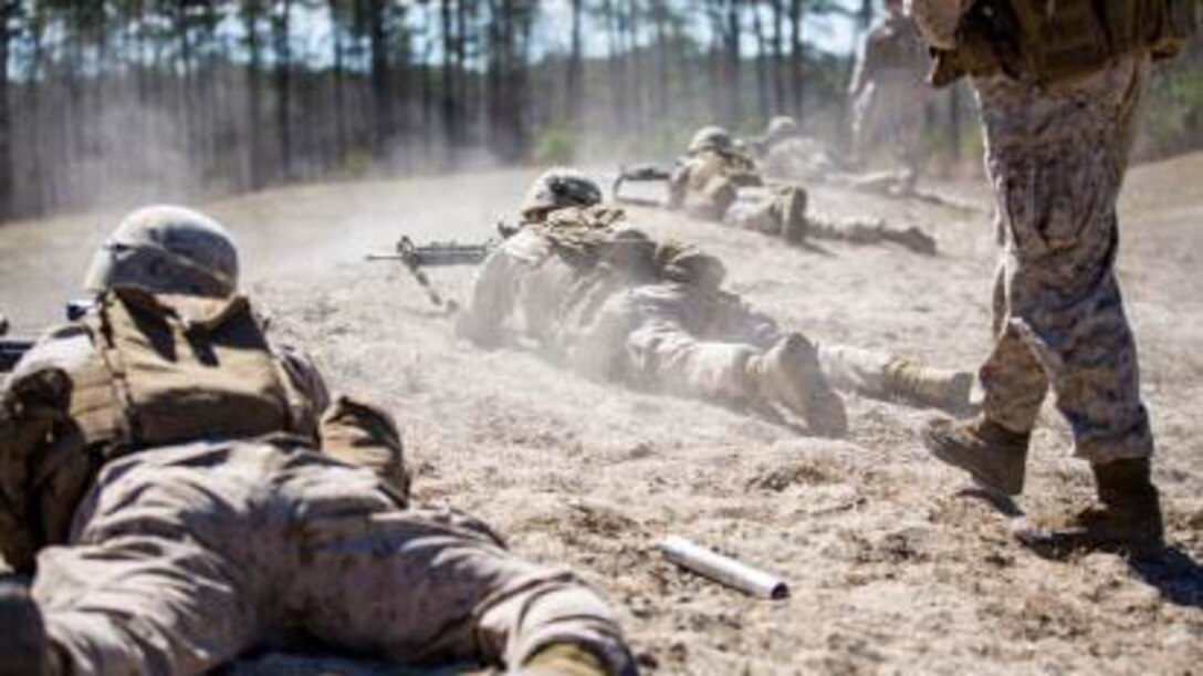 Marines with Charlie Company, 1st Battalion, 6th Marine Regiment provide suppressive fire at a target during a live-fire, fire-team attack range exercise aboard Camp Lejeune, N.C., March 18, 2015. One fire team at a time conducted the attack, advancing across a field while providing suppressive fire and utilizing various munitions. 