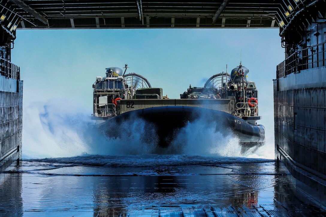 U.S. Navy Landing Craft, Air Cushioned 82 with Assault Craft Unit 5, heads into the well deck of the USS Anchorage (LPD 23) during Composite Training Unit Exercise (COMPTUEX) off the coast of San Diego March 23, 2015. LCACs are utilized to transport vehicles, personnel and cargo between the ships of the Essex Amphibious Ready Group and the shore. (U.S. Marine Corps photo by Sgt. Jamean Berry/Released)