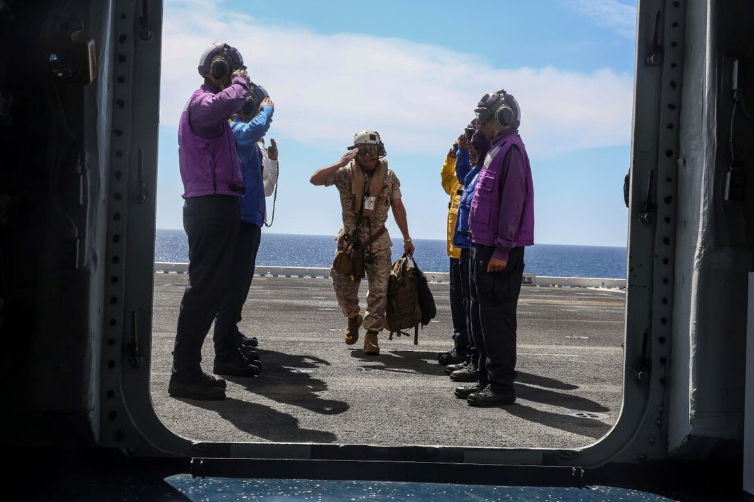 U.S. Marine Brig. Gen. Joaquin Malavet is greeted onto the USS Essex (LHD 2) during Composite Training Unit Exercise (COMPTUEX) off the coast of San Diego March 23, 2015. Malavet is the commanding general of 1st Marine Expeditionary Brigade. The 15th Marine Expeditionary Unit and Essex Amphibious Ready Group are currently at sea preparing for their upcoming deployment.  (U.S. Marine Corps photo by Cpl. Anna Albrecht/Released)