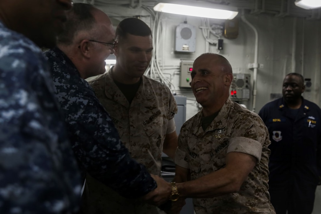 U.S. Marine Brig. Gen. Joaquin Malavet, right, is greeted by U.S. Navy Capt. Clinton A. Carroll and Col. Vance L. Cryer onto the USS Essex (LHD 2) during Composite Training Unit Exercise (COMPTUEX) off the coast of San Diego March 23, 2015. Malavet is the commanding general of 1st Marine Expeditionary Brigade, Carroll is the commodore of the Essex Amphibious Ready Group and Cryer is the commanding officer of the 15th Marine Expeditionary Unit. The 15th MEU and Essex ARG are currently at sea preparing for their upcoming deployment.  (U.S. Marine Corps photo by Cpl. Anna Albrecht/Released)