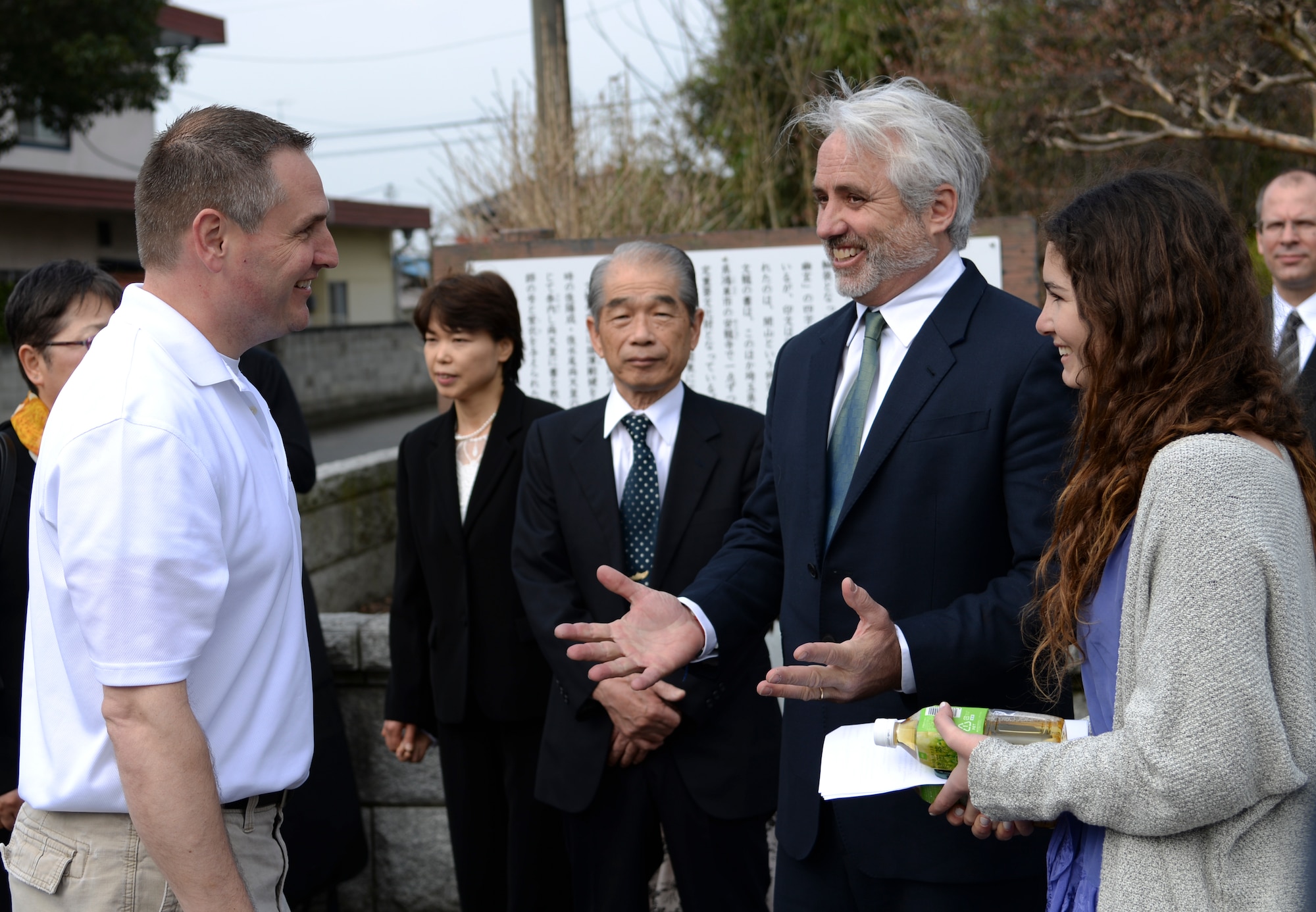 Maxwell Taylor Kennedy and his daughter, Noah Isabella Rose Kennedy, greet Col. Douglas DeLaMater, 374th Airlift Wing commander, at a B-29 memorial ceremony in Gunma Prefecture, Japan, March 21, 2015. The ceremony marks the 70th anniversary of the crash between two B-29 Superfortress aircraft that killed 23 Airmen. Kennedy was the guest speaker for the event. He finished his speech by saying, “There are many different challenges and difficulties all around the world. There is no greater friendship between countries and between people like the bond between Japan and America.” (U.S. Air Force photo by Senior Airman Michael Wash-burn/Released)