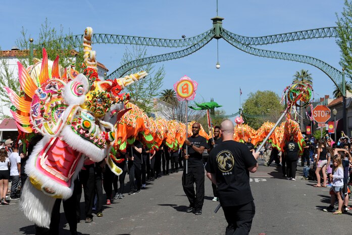 The "Hong Wan Lung" Dragon dances during the Bok Kai Festival in Marysville, Calif., Mar. 21, 2015. Members of Team Beale volunteered at the festival to bring the dragon to life. (U.S. Air Force photo by Staff Sgt. Robert M. Trujillo/Released)
