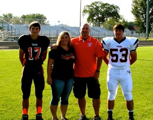The Riedels pose for a family photo earlier this year at the Mountain Home High School football field. The Riedels moved to Mountain Home, Idaho, three years ago, where Christen and Hunter attend Mountain Home High School. (Courtesy Photo)