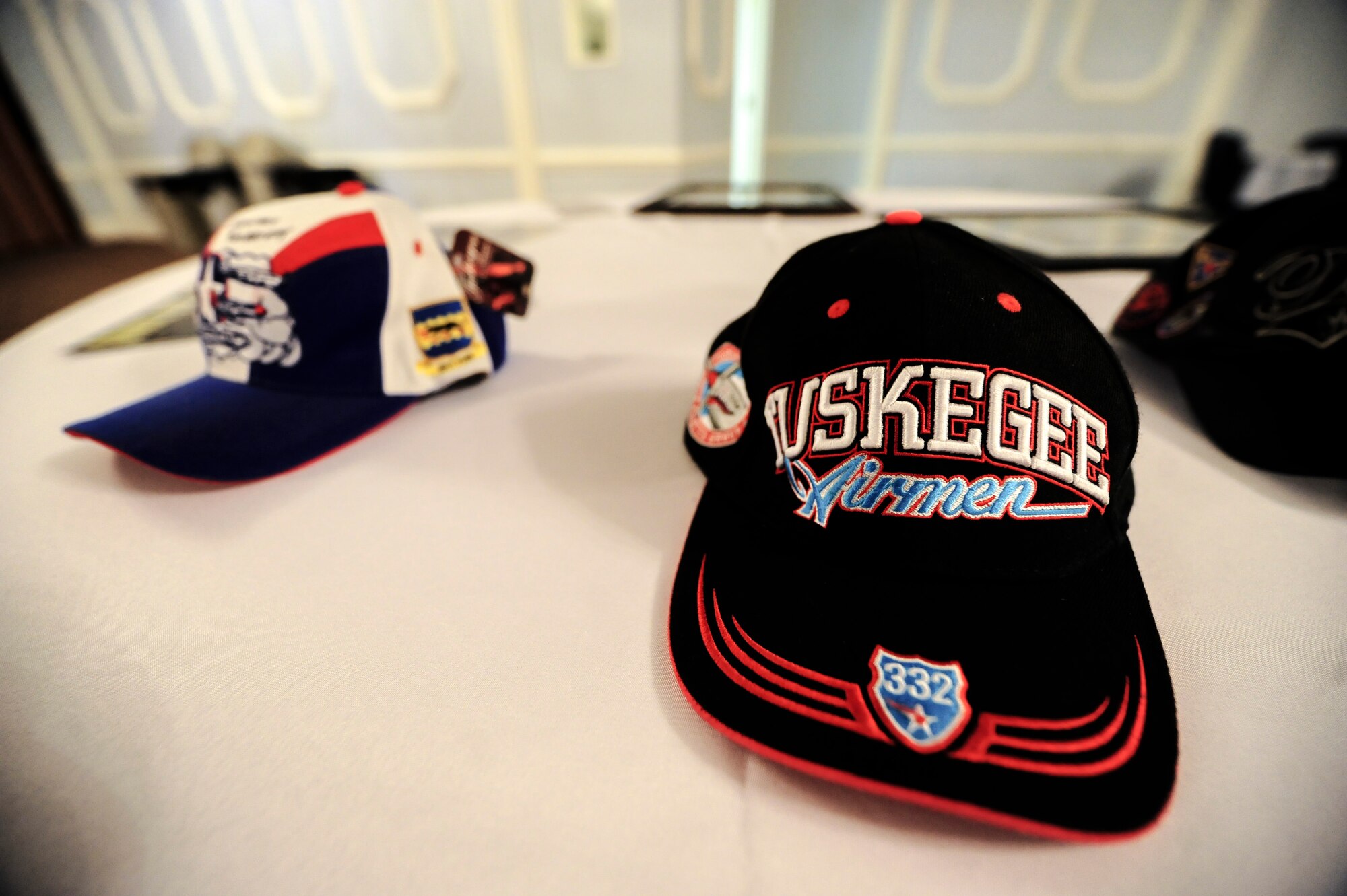 Tuskegee Airmen mementos are displayed during a heritage luncheon, March 18, 2015, at Seymour Johnson Air Force Base, North Carolina. Members of the Wilson V. Eagleson Chapter of Tuskegee Airmen visited and spoke with Airmen about the trials and tribulations they endured to fight for their country. (U.S. Air Force photo/Senior Airman Brittain Crolley)
