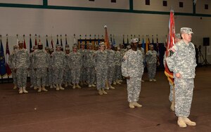 U.S. Army Soldiers from the 53rd Transportation Battalion (Movement Control) Headquarters and Headquarters Detachment, 7th Transportation Brigade (Expeditionary), stand at attention during a redeployment ceremony at Fort Eustis, Va., March 23, 2015. While deployed in support Operation United Assistance, the Soldiers were responsible for downloading cargo including protective gear and delivering it to Ebola treatment units. (U.S. Air Force photo by Staff Sgt. Teresa J. Cleveland/Released)